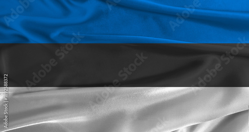 Foto Flag of Estonia with fabric textured background