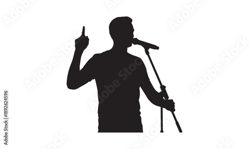 Silhouette of a man with a microphone, pointing a finger upwards, giving a speech.
