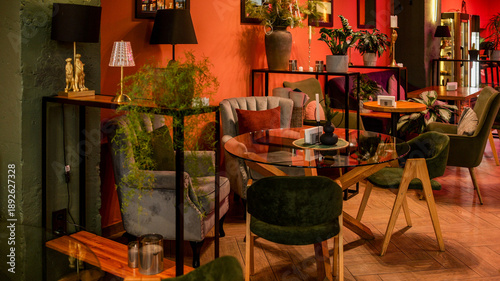 Valokuva Cozy cafe interior with plush seating and warm ambient lighting