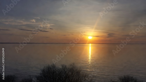 Golden Horizon: Serene Sunset Over Calm Water Landscape