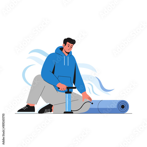 Young hispanic male inflating camping mattress with pump