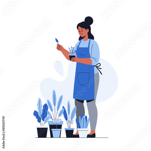 Young hispanic female gardner caring for potted plants in apron