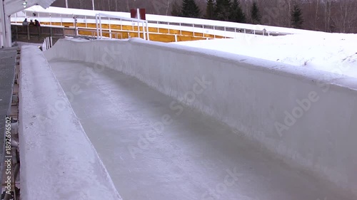 Luge athlete racing on the ice track