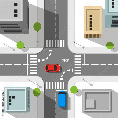 Top-down view of city intersection with cars, buildings and crosswalks