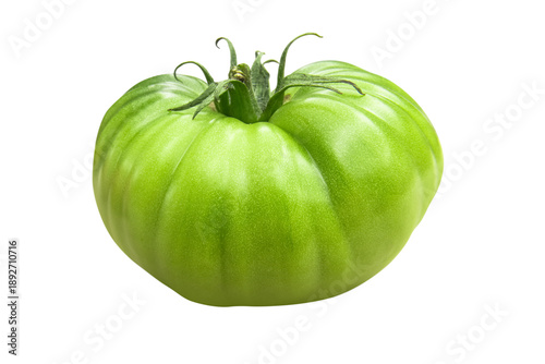 A fresh, unripe green tomato isolated on a transparent background.