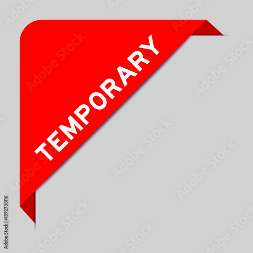 Red color of corner label banner with word temporary on gray background