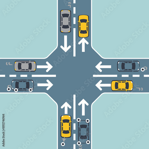 Busy Four-Way Intersection with Cars and Traffic Arrows