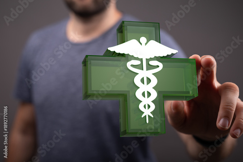 A person holding a green me...