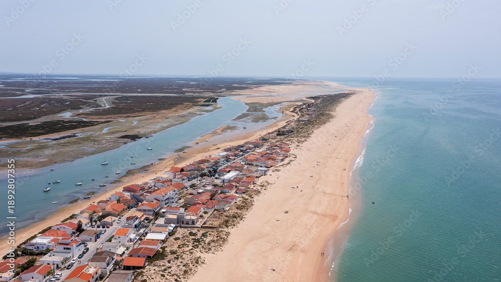 custom made wallpaper toronto digitalRia Formosa in Faro Portugal shows Praia de Faro from above. The sandy shore meets the water and nearby houses sit close to the beach. Boats hint at activity