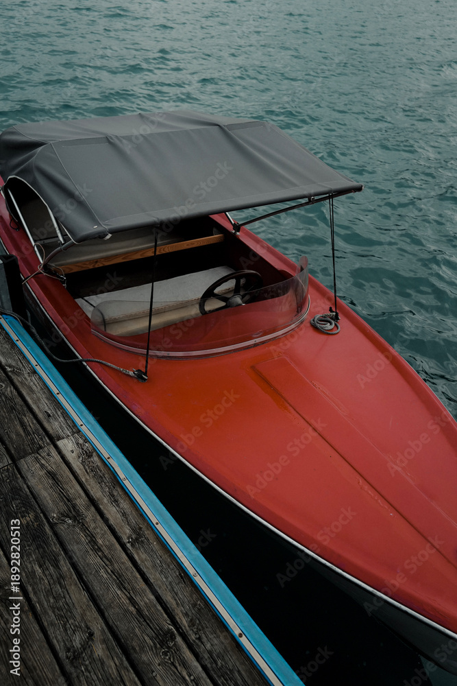 Obraz premium Red Classic Boat at Dock