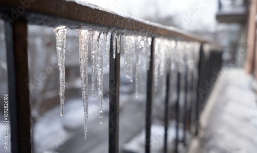 A railing covered in icicles