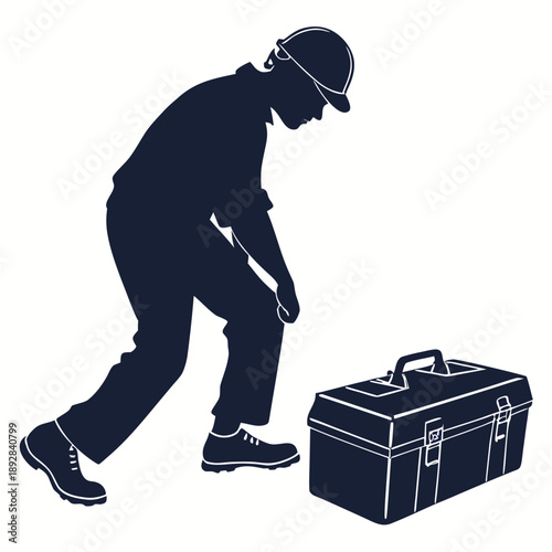 Worker inspecting toolbox