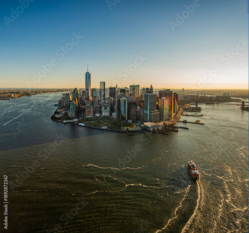 Schilderij op canvas high-altitude aerial view of Lower Manhattan at sunset