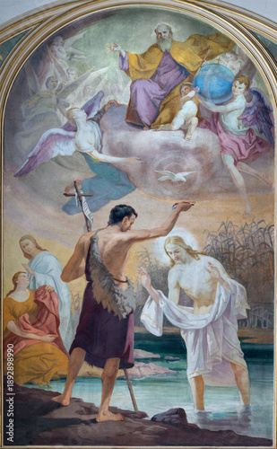 Photography BUSTO ARSIZIO, ITALY - JANUARY 19, 2026: The fresco of Baptism of Jesus in church Chiesa di San Michaele by Angelo Bonfanti (1948)
