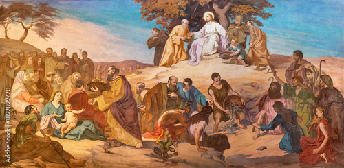 BUSTO ARSIZIO, ITALY - JANUARY 19, 2026: The fresco of Feeding the multitude in church Chiesa di San Michaele by Angelo Bonfanti (1948). 