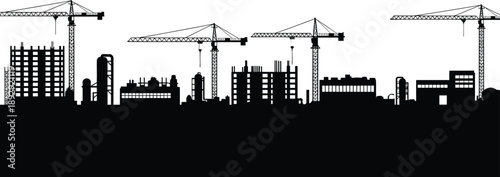 Black silhouette of city skyline with construction cranes and buildings