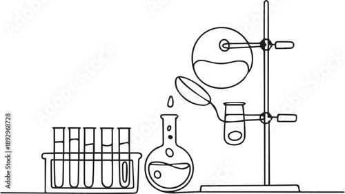 Laboratory equipment setup for a chemistry experiment with a flask and test tubes on a table viewed from the side