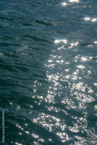 sunlight sparkling on the ocean’s surface