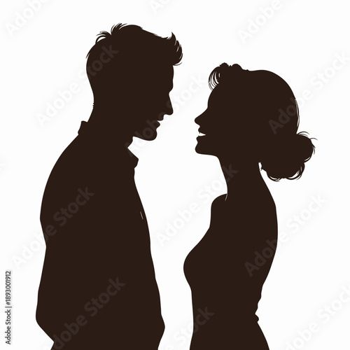 Silhouette of a Couple Facing Each Other in Profile View With Soft Lighting Creating a Romantic and Mysterious Atmosphere