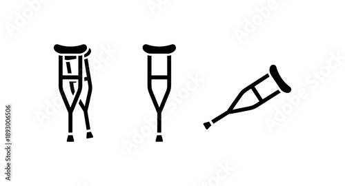 Set of three black crutches icons in different positions on a white background