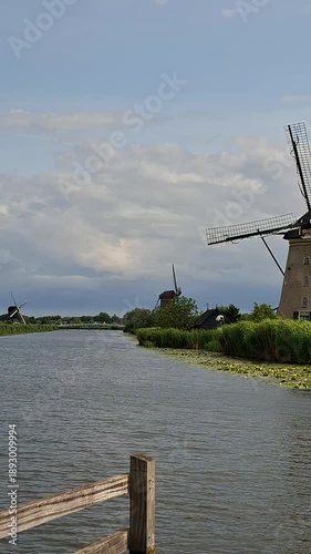 Panoramic landscape of the famous unesco windmills along the waterway in Kinderdijk, Netherlands