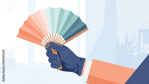 A hand in a dark blue glove holds a vibrant, segmented fan open