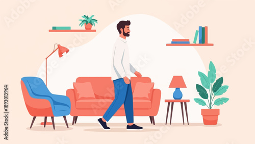 A man walks past a sofa and armchair in a minimalist room