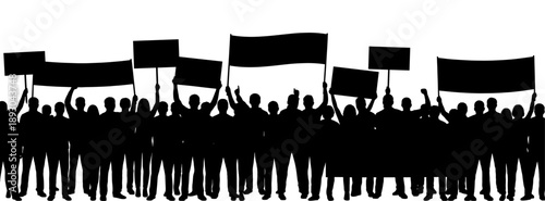 Silhouette of demonstrators marching with signs and flags