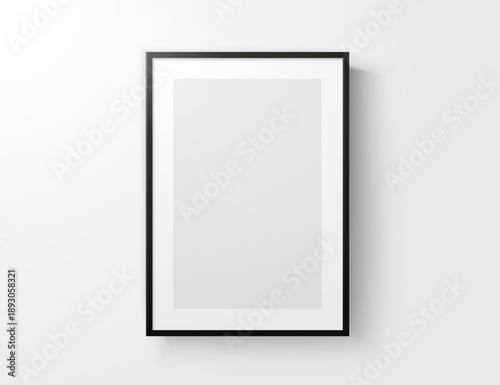 Blank Picture Or Poster Mock Up With Black Frame On White Wall