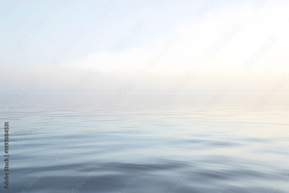 Obraz premium Calm water surface with subtle ripples 