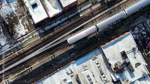 Cinematic 4K Drone Aerial Chicago West Side Flying Over CTA Green Line 'L' Train Tracks in Garfield Park