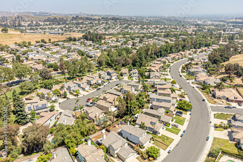 Chino Hills, California – June 12, 2024: Aerial Drone Chino Hills City View Photo toward Freeway 142, Green Valley Dr, Peyton Dr with House, Home, Town, Street, Road, Cityscape
