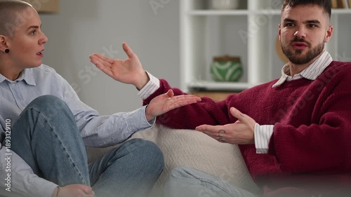 Frustrated couple arguing during relationship therapy session