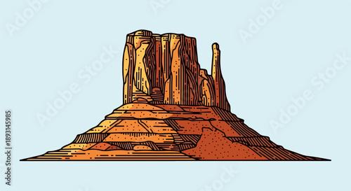 Dramatic desert landscape with a towering rugged rock formation