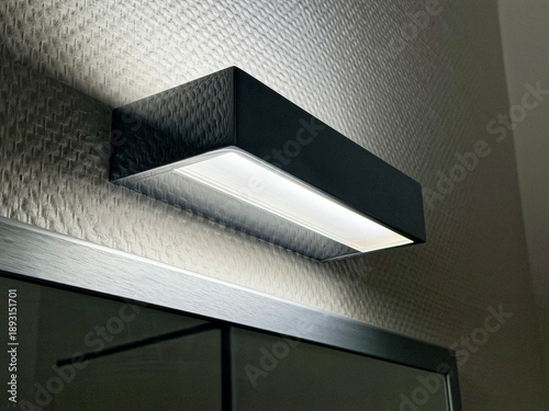 Schilderij op canvas Modern Wall Mounted LED Light Fixture in Contemporary Interior Design