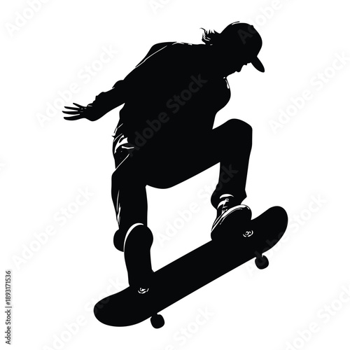 Silhouette of skateboarder jumping in air