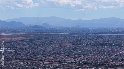 Wide drone panorama of northern Ecatepec during afternoon light