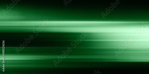 Billede på lærred Dynamic green light streaks sweep across the abstract background, creating a viv