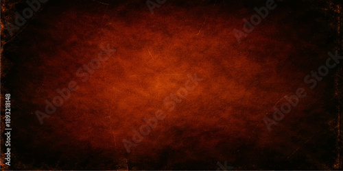 A dark grunge texture of burning old paper featuring intense orange flames and red smoke patterns against a black background