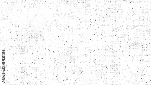 White textured background with scattered grey dots and grid pattern