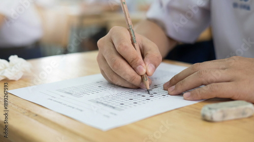 Student Filling Out Exam Sheet Photo Of Student Filling Out Exam Sheet