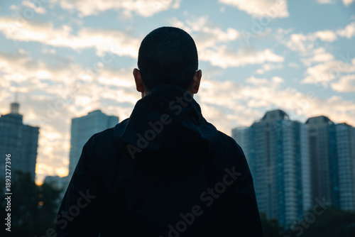 Photos Focused bald woman looking forward in city