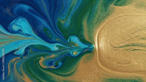 Abstract Fluid Art Swirls Of Blue Teal Green And Gold Glitter Paint Mixing And Flowing Dynamic Motion