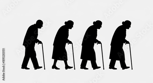 Silhouettes of elderly people walking with canes representing aging.