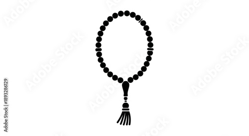 Black buddhist prayer beads with tassel on white background symbolizing mindfulness and meditation