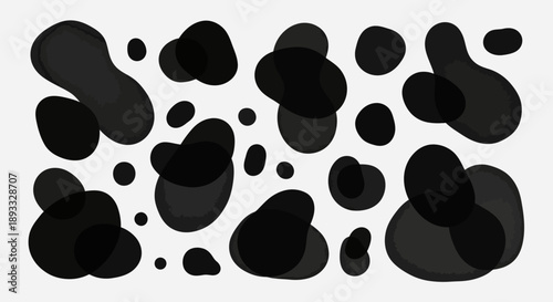 Elegant monochromatic inkblot pattern, featuring fluid, abstract shapes on bright surface
