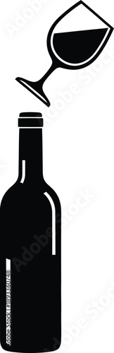black and white wine bottle and glass