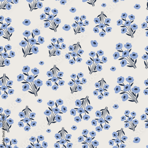Hand drawn blue floral seamless pattern with small flower bouquets on light background