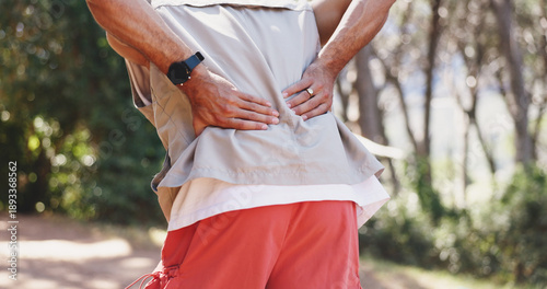 Photos Man, hands and fitness in nature with back pain, muscle spasm and hiking injury