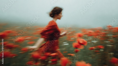 Woman in red dress running in a blurry field of bright poppies. Feel freedom and joy concept. Free movement and nature. Happy girl enjoy summer. Floral scent, flowers perfume.